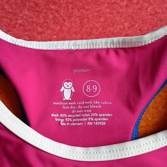 Primary 8-9 Raspberry Tipped Swim Top - Picture 2 of 3
